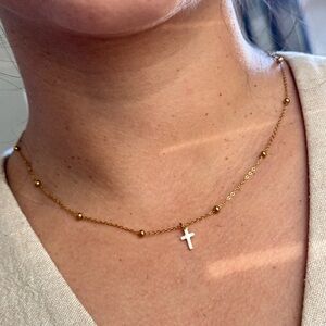 Elegant Gold Necklace with White Cross Pendant